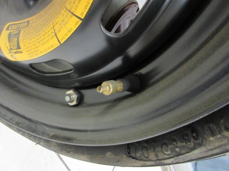 84-89 Nissan 300ZX UNUSED spare tire w/inflator and tie Down | eBay