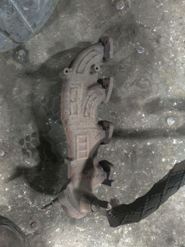 LEFT EXHAUST MANIFOLD OEM 05-06 FORD F150 1YR WRNTY - Image 1