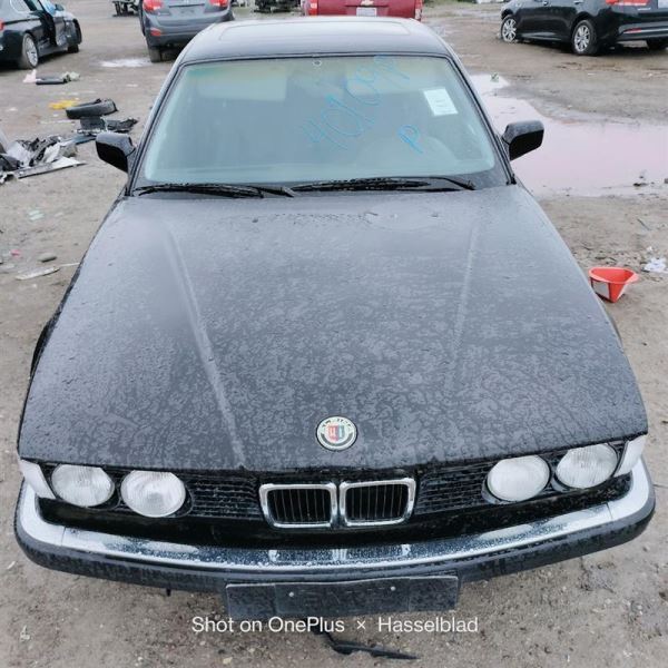 1988-1992 BMW 735I Black Hood 41618101914 OEM.  - Image 1