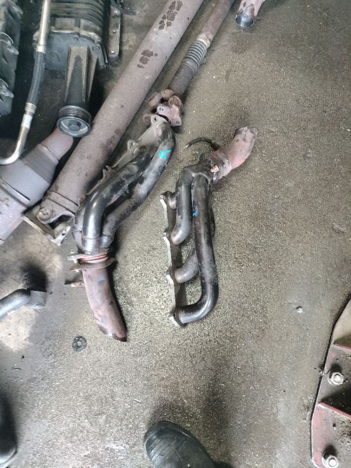 LEFT EXHAUST MANIFOLD OEM 05-10 FORD F150 1YR WRNTY - Image 1