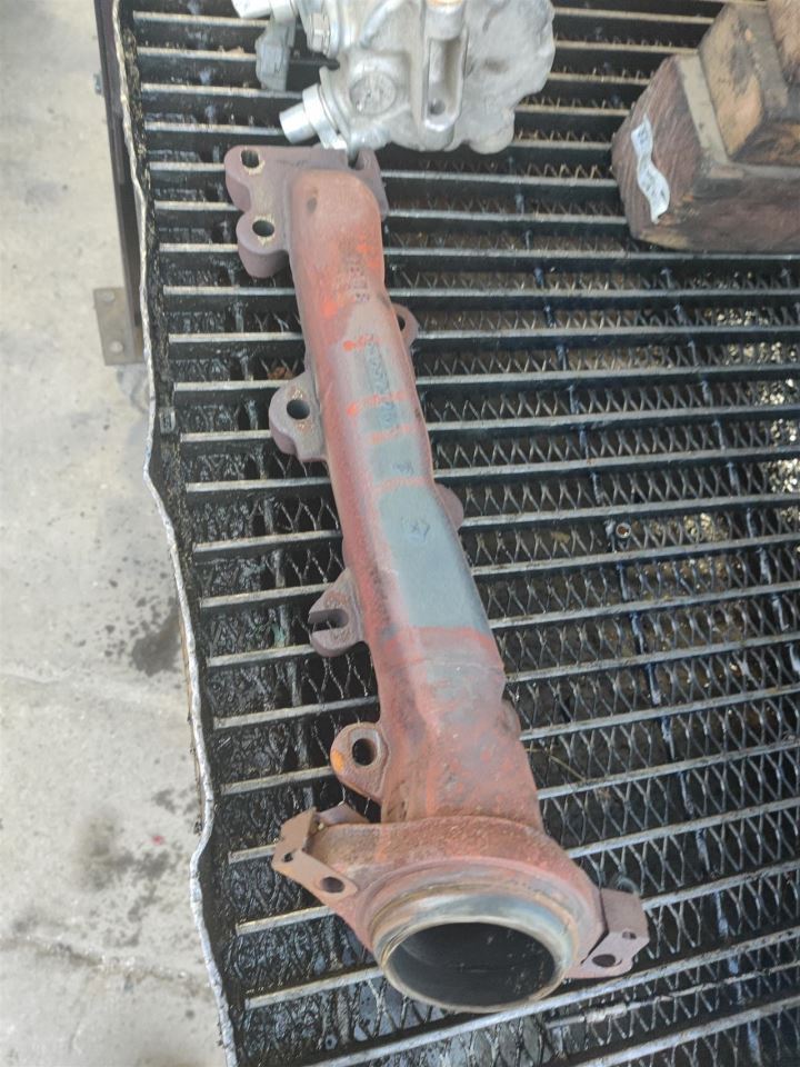 LEFT EXHAUST MANIFOLD OEM 22-24 RAM1500 1YR WRNTY 68365739AA - Image 1